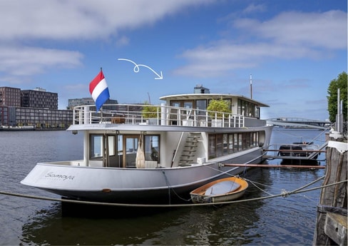 Isn't she a beauty? The top floor (including the huge sun deck and private sauna!) is where you'll be staying.